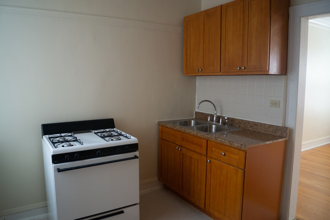 Kitchen - New Venture Realty South Shore Apartments