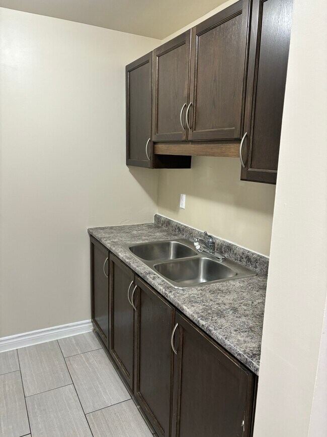 Photo du bâtiment - 225-225 Old Carriage Dr