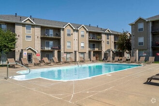 There's no better way to beat the heat than taking a dip in our refreshing swimming pool. - Eagle Run Apartments