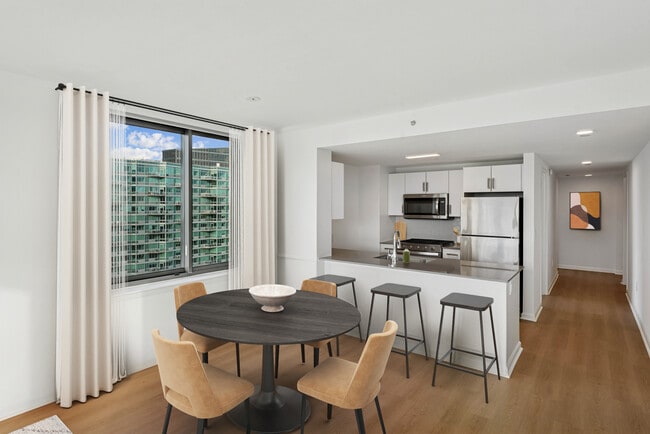 Renovated Package I kitchen and dining room - Avalon Riverview