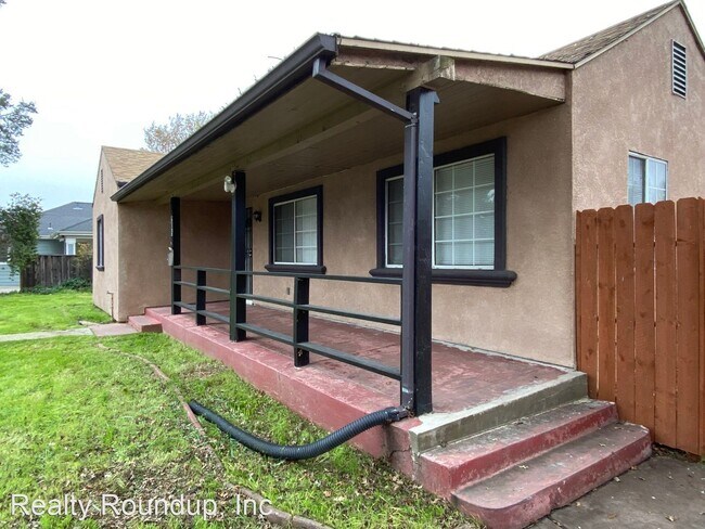 Foto del edificio - 4 br, 3 bath House - 205 W Swain Rd