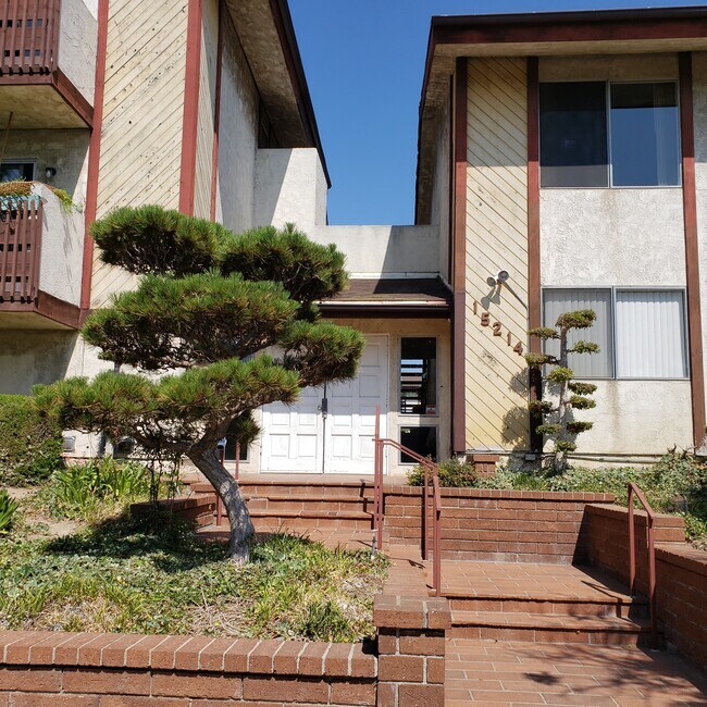 Main entrance - 15214 S Raymond Ave