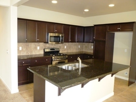 Building Photo - Fantastic Harlan Patio Home with Fenced Fr...