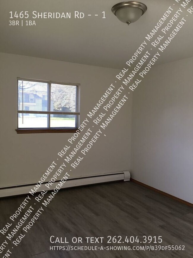 Foto del edificio - Spacious 3 Bedroom Lower Apartment!!