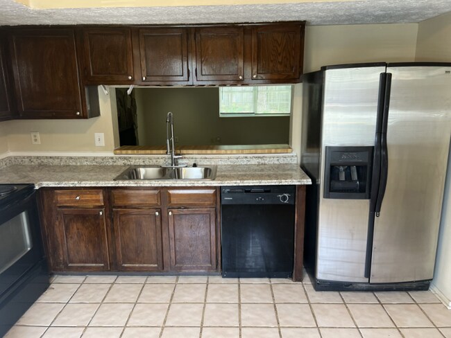 Foto del edificio - 6445 Meadow Rue Dr