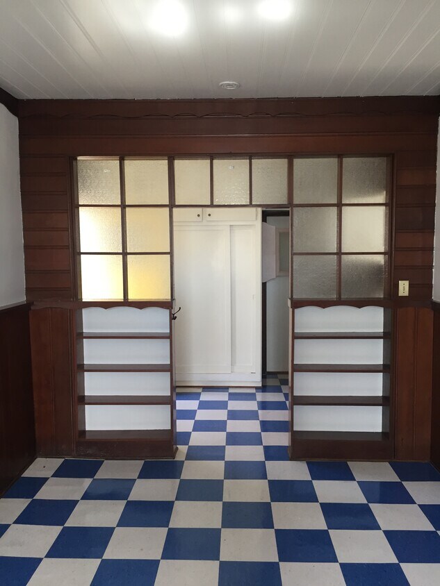 Built in bookshelves. - 6156 Fair Ave