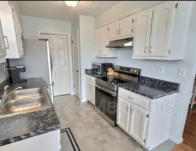 Building Photo - 5595 Oak Branch Cir N