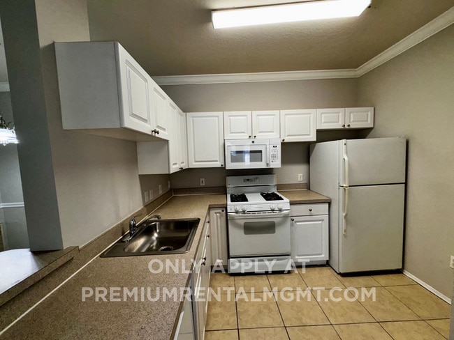 Building Photo - Spacious 2 Bed / 2 Bath Second-Floor Condo at Grand Reserve at Kirkman Park