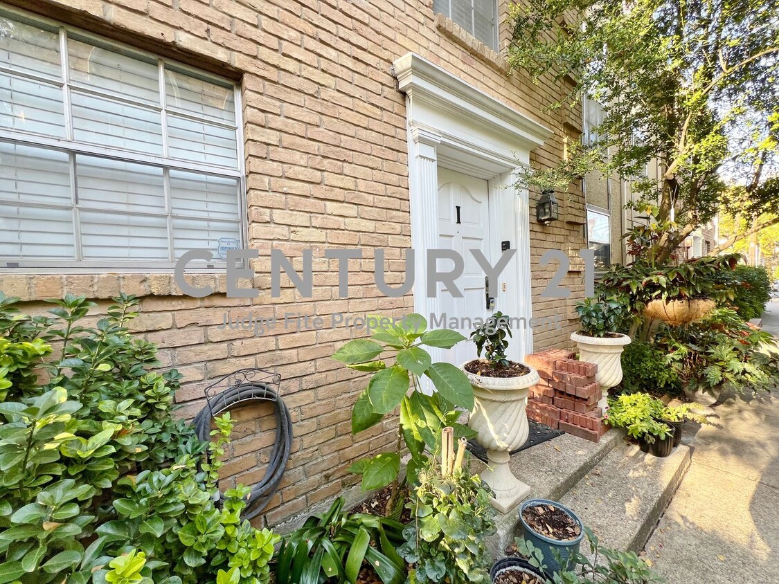 Primary Photo - Charming 2-Story 2-1.5 Condo Ready for Mov...