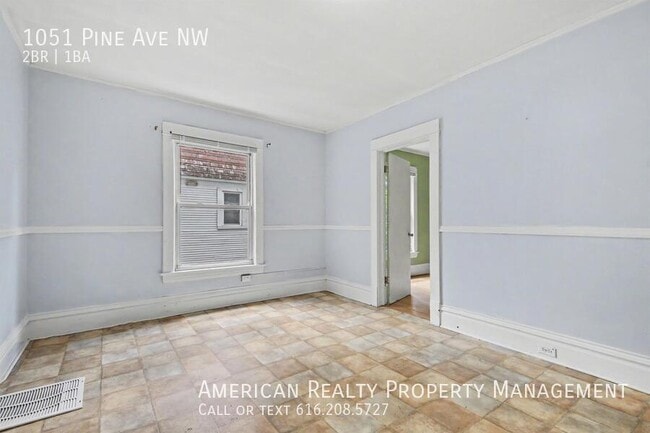 Building Photo - 1051 Pine Ave NW