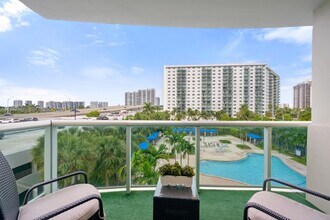 Building Photo - 19370 Collins Ave