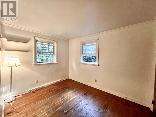 Building Photo - 2832-2832 Sunningdale Rd W
