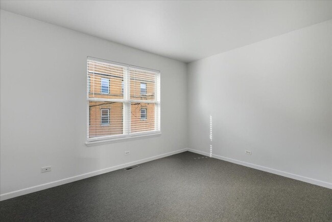 Foto del edificio - 4530 S Woodlawn Ave