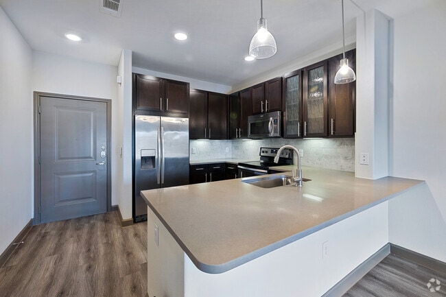 1BR, 1BA - 685SF - Kitchen - ELEVATE Spring Crossing