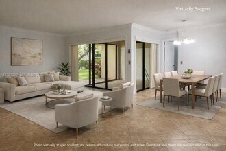 Building Photo - 3933 Cocoplum Cir