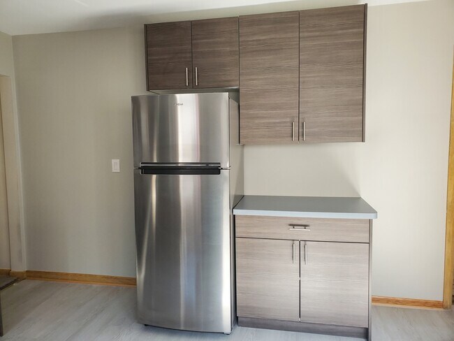 new fridge and cabinets - 3535 N Orange Ave