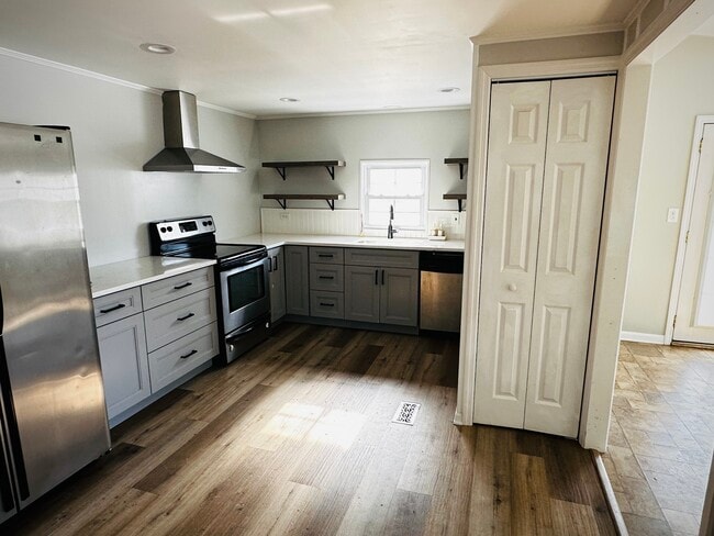 Self-closing cabinets, pantry storage, and new flooring - 5 Greenwich Dr