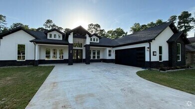 Building Photo - 34119 Conroe Huffsmith Rd