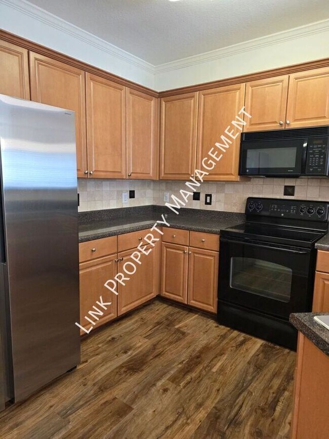 Foto del edificio - Beautiful One-Level Downstairs Condo in Prime Hamilton Place Location