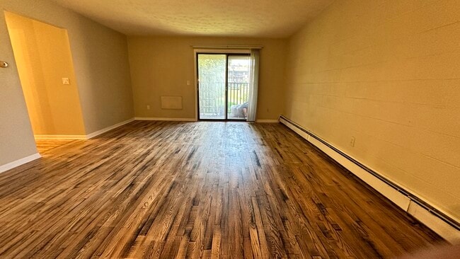 Living room with overlooking balcony - 581 Crown St