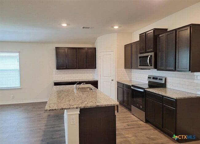 Building Photo - 609 Great Plains