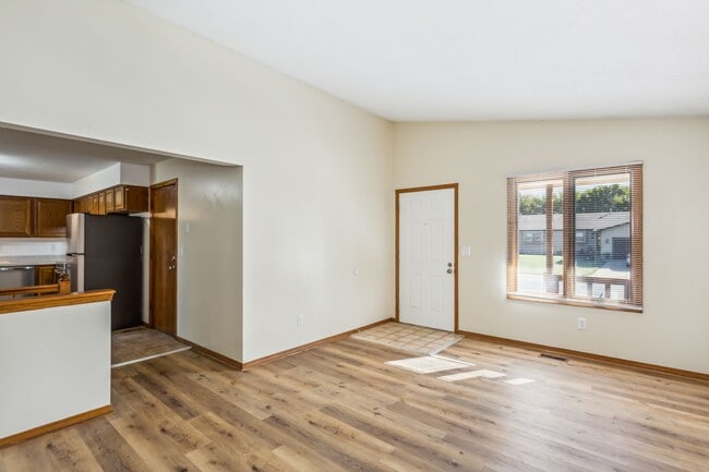 Building Photo - Derby Duplex with Fenced Yard!