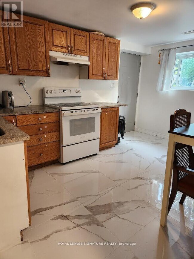 Photo du bâtiment - 406 Tamarack Dr