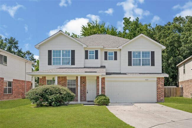 Foto del edificio - 5019 Woodland Meadows Ln