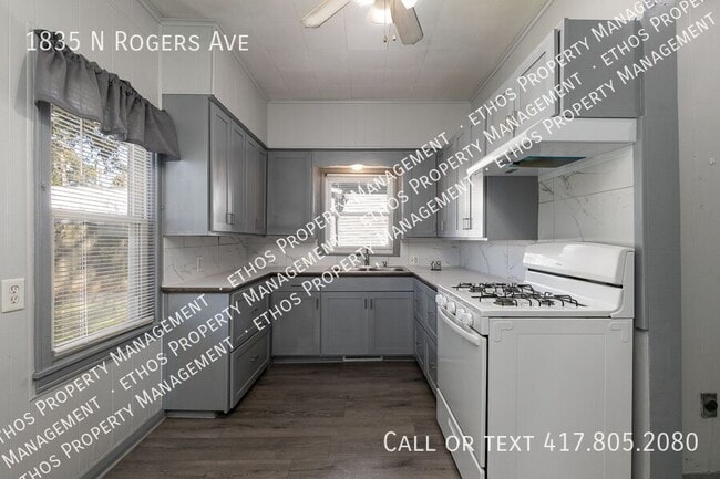 Building Photo - 1835 N Rogers Ave