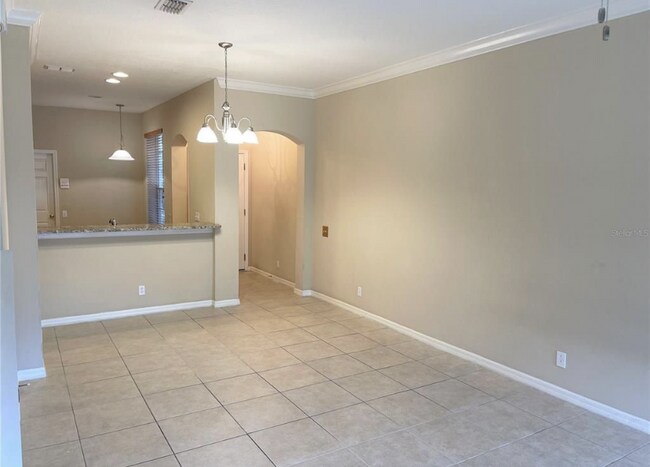 Living Room/Breakfast Bar - 4028 Bismarck Palm Dr