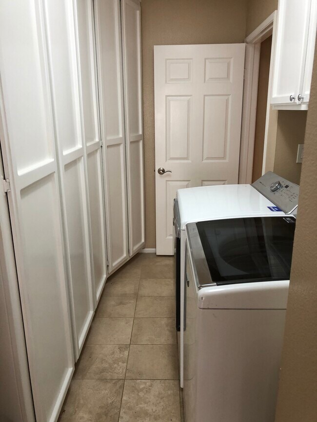 laurndry room and storage - 192 Hartford Dr