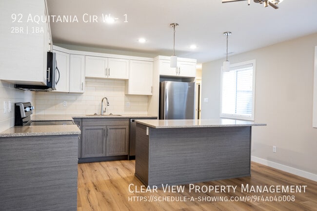 Building Photo - Beautiful 2 bedroom, 1 bathroom suite very close to the University!