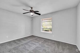 2BR, 2BA - 897SF - Primary Bedroom - Preserve at Westchase