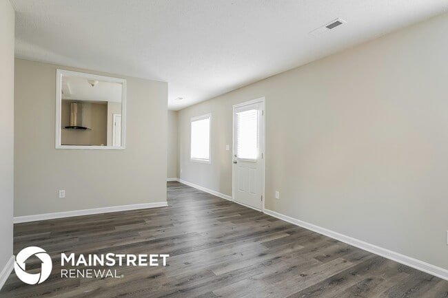 Foto del edificio - 5504 Carriage Woods Dr