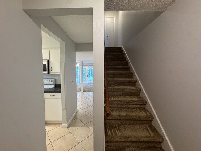Building Photo - AVAILALBE OCTOBER! Two story Townhouse loc...