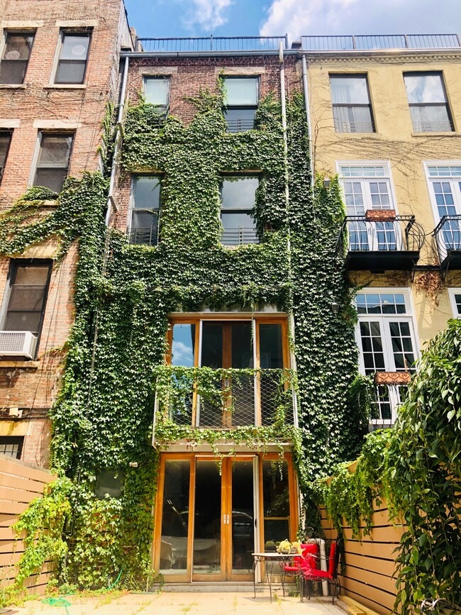 4 floors with finished basement plus private backyard - 112 W 118th St