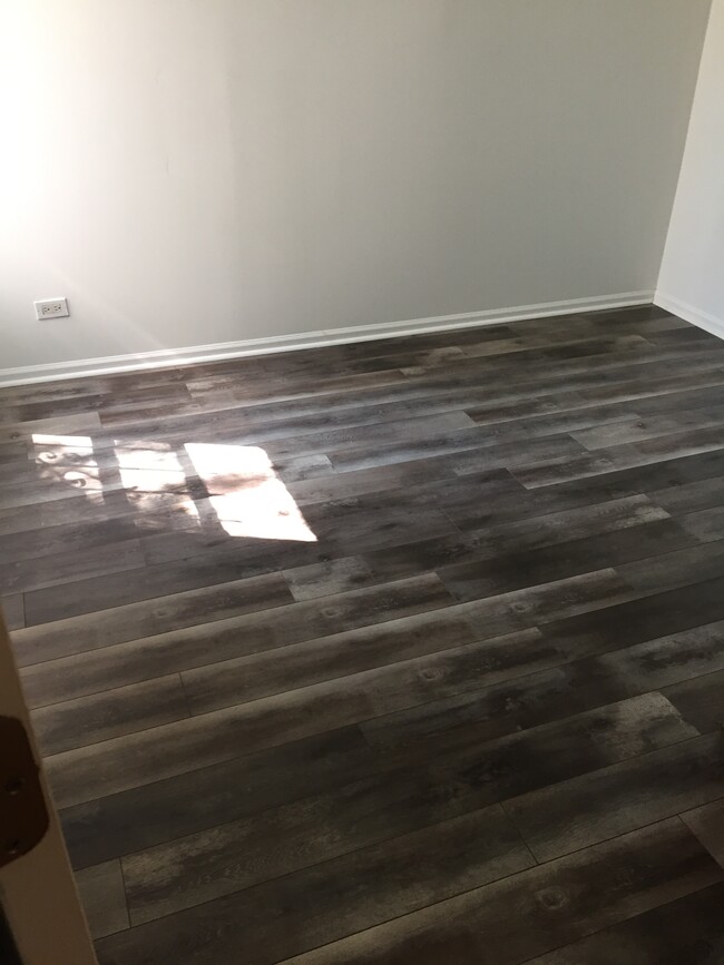 Bedroom 1 / Hardwood floor/ large c - 4341 W Jackson Blvd