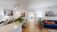 Located in Boiling Springs, SC, this single-story 2-bedroom, 3-bathroom home offers a thoughtfully designed open-concept layout that maximizes comfort and functionality. Light hardwood-style flooring flows throughout the main living areas, complementing the bright, neutral color palette that creates a welcoming ambiance.

The open living and dining area is generously proportioned, with abundant natural light streaming through large windows and a ceiling fan overhead. The space transitions seamlessly into a well-equipped kitchen featuring gray cabinetry with gold hardware, stainless steel appliances, white countertops, and tile flooring — a practical yet stylish hub for the home.

The spacious primary bedroom offers a comfortable retreat with a closet and easy access to its own bathroom. The second bedroom is bright and airy, with a window that fills the room with natural light. Three bathrooms serve the home, including one featuring a soaking tub and another with a full tub-shower combination and modern vanity with ample storage.

Five closets are distributed throughout the home, providing excellent storage capacity. A dedicated laundry area and a hallway connecting the private quarters to the main living spaces round out the floor plan, making this home as practical as it is inviting.