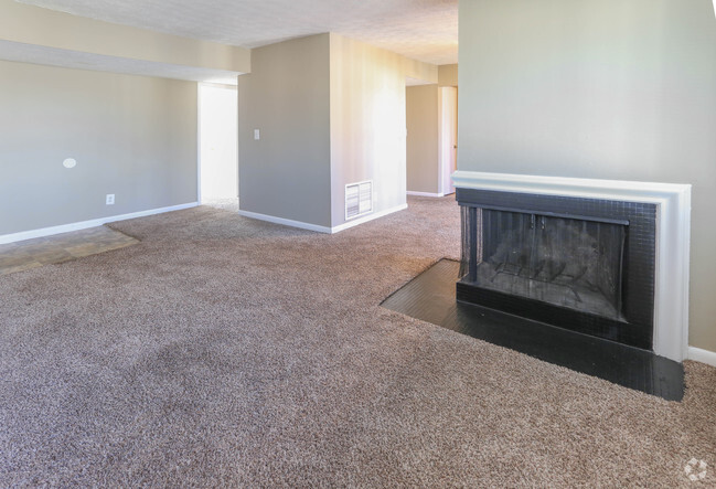 2BR, 1BA - 990 SF - Living Room with Fireplace - Patchen Place Apartments