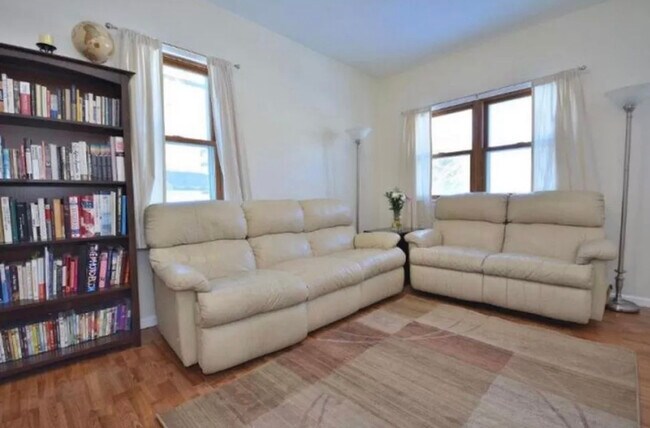 Living room with tons of natural light! - 1817 E Saint Francis Ave