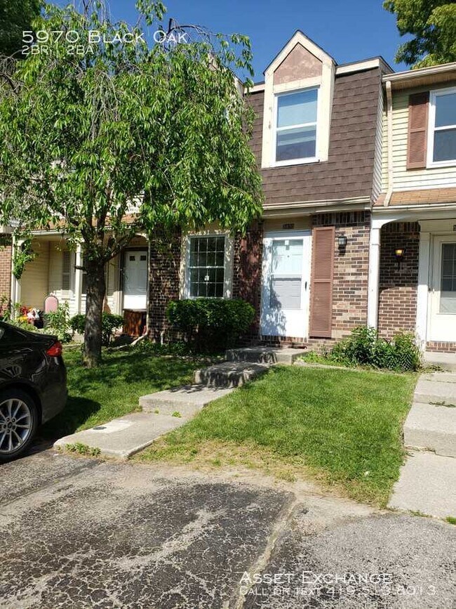 Building Photo - Cozy Town Home