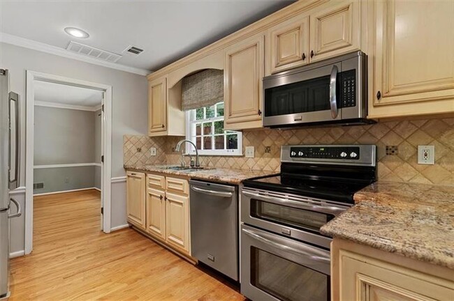 Building Photo - 5632 Woodsong Trail