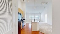 Step into a world of endless possibilities in this exquisite 900 square foot haven. This beautifully appointed two-bedroom, three-bathroom residence is your gateway to a life of luxury and convenience. The heart of this home is a stunning chef's kitchen, boasting sleek cabinetry, top-of-the-line stainless steel appliances, and a spacious island perfect for culinary adventures or casual dining. Natural light floods the living spaces through large windows, creating an airy and inviting atmosphere that seamlessly blends indoor comfort with outdoor vistas. The primary bedroom, a generous 160 square feet, offers a private retreat with ample space for relaxation. Immaculate bathrooms feature elegant finishes, combining functionality with style. Plush carpeting in the bedrooms provides comfort underfoot, while easy-to-maintain tile and hardwood floors grace the common areas. With its thoughtful layout and modern amenities, this home is designed to elevate your everyday living experience. Whether you're entertaining guests or enjoying a quiet evening at home, this residence at Sullivan Place offers the perfect backdrop for creating lasting memories. Don't miss this opportunity to make your dream lifestyle a reality – schedule your viewing today and step into the home you've always imagined.