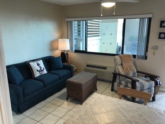 View from kitchen to living room - 3300 N Surf Rd