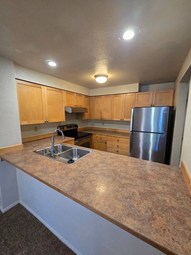 Building Photo - Lea Hill Condominiums