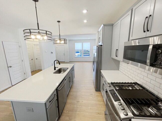Building Photo - HALF-OFF APPLICATION FEES! Stunning 3 Bedr...