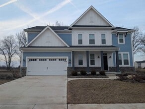 Building Photo - 8246 Woodstar Dr