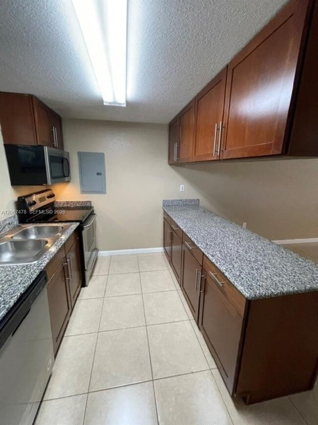 Building Photo - 8950 SW 69th Ct
