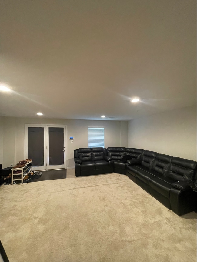Basement living area - 5613 Barnstormers Ln