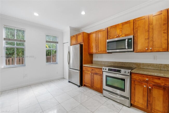 Foto del edificio - 4 br, 3.5 bath House - 10770 NW 74th Ln